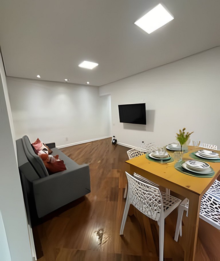 Perto da Praia com ar e estacionamento