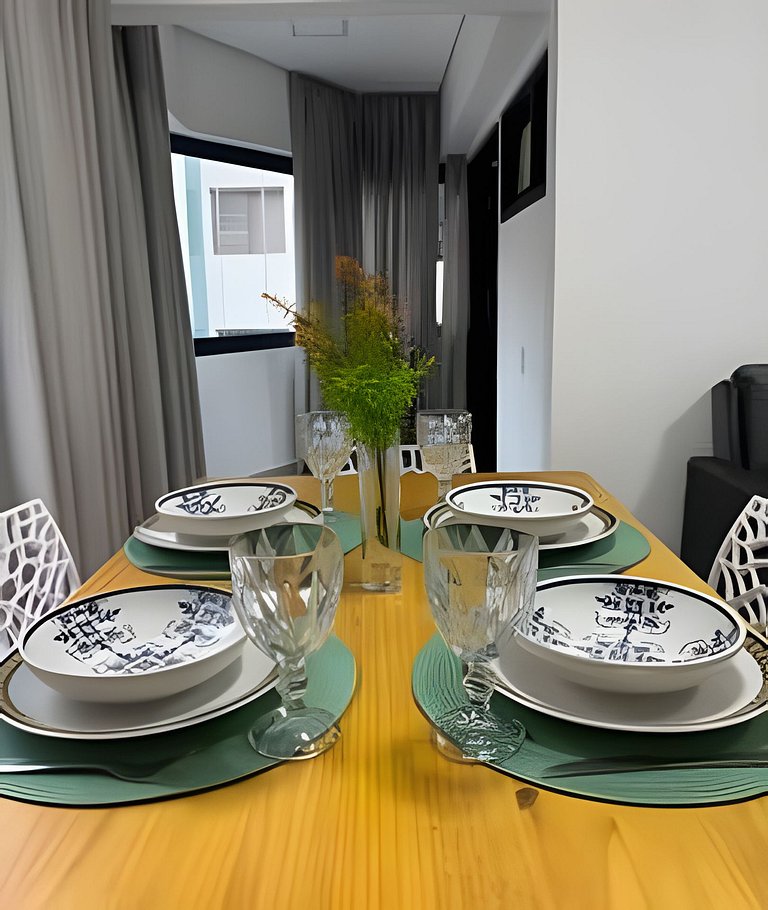 Perto da Praia com ar e estacionamento