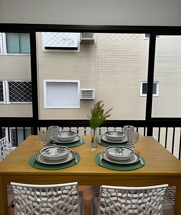 Perto da Praia com ar e estacionamento