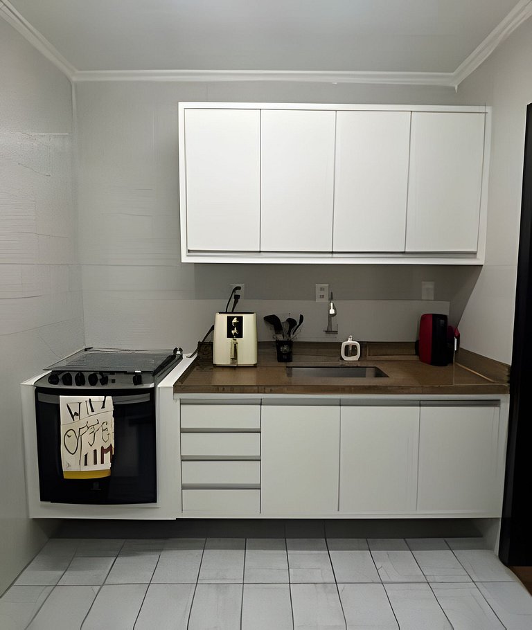 Perto da Praia com ar e estacionamento