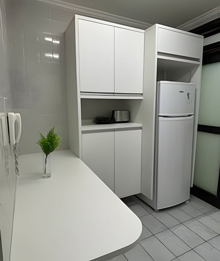 Perto da Praia com ar e estacionamento