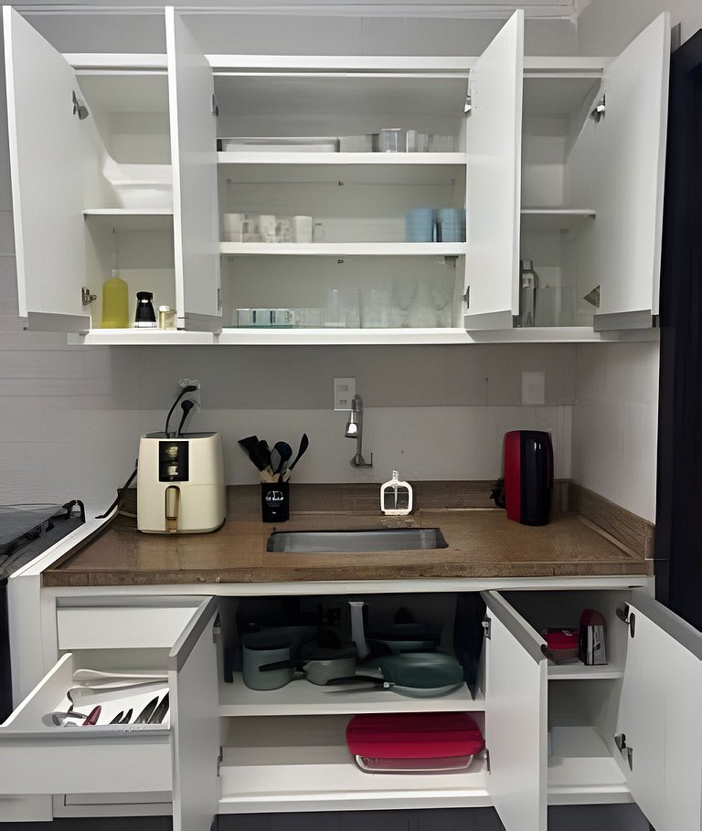 Perto da Praia com ar e estacionamento