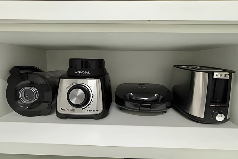 Perto da Praia com ar e estacionamento