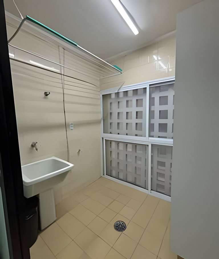 Perto da Praia com ar e estacionamento