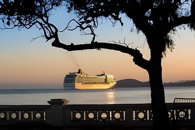 Perto da Praia com ar e estacionamento