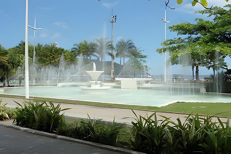 Perto da Praia com ar e estacionamento