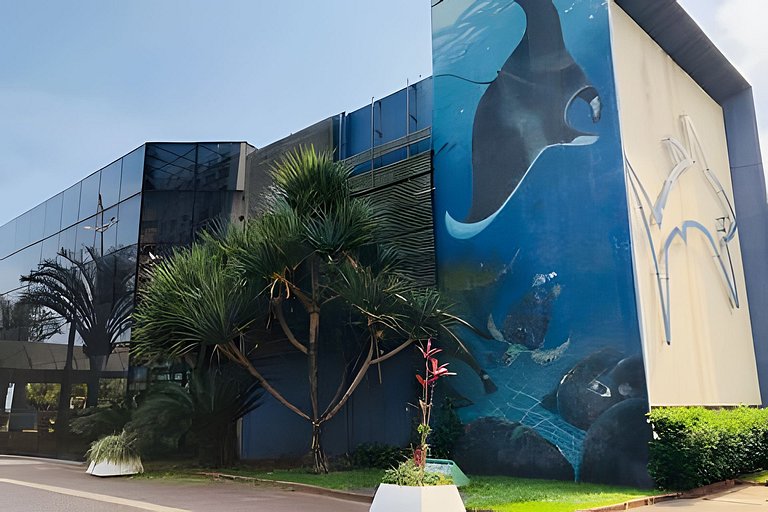 Perto da Praia com ar e estacionamento