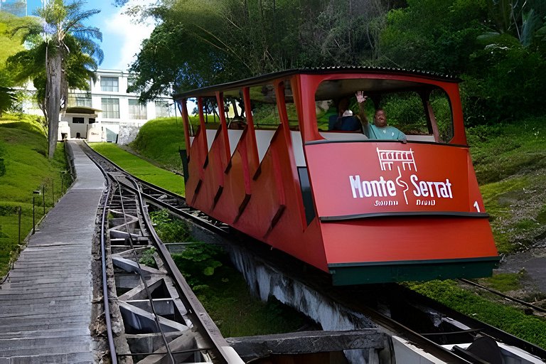 Perto da Praia com ar e estacionamento